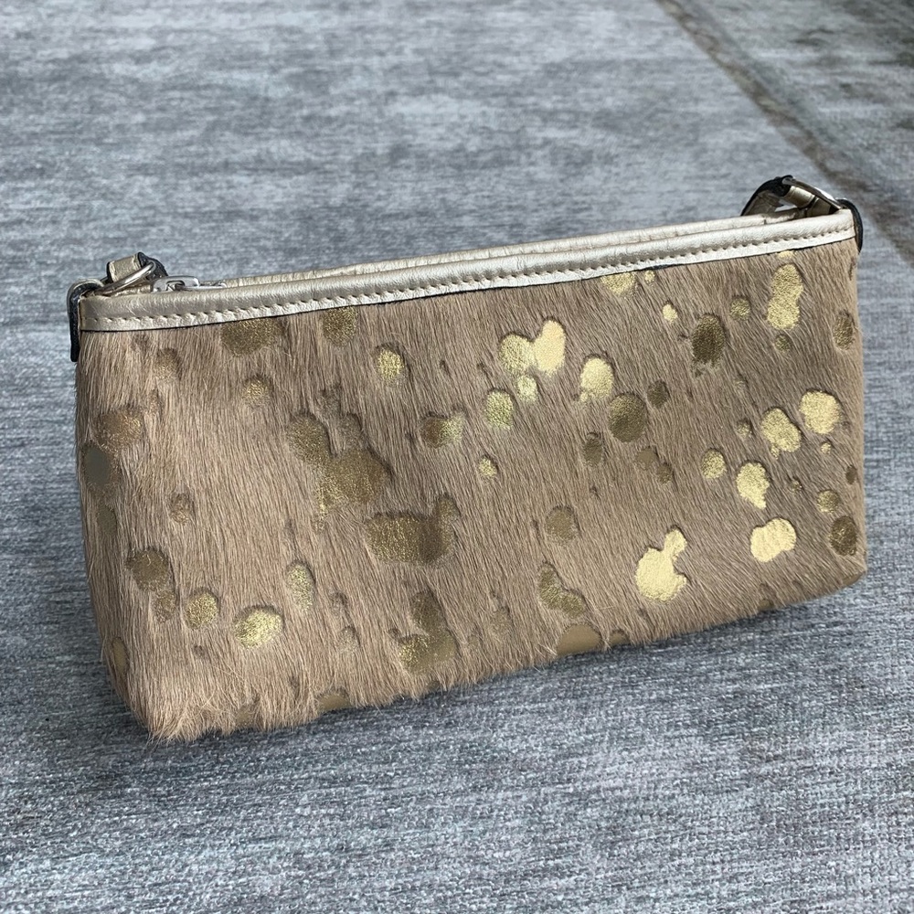 Animal hair and gold leather should bag